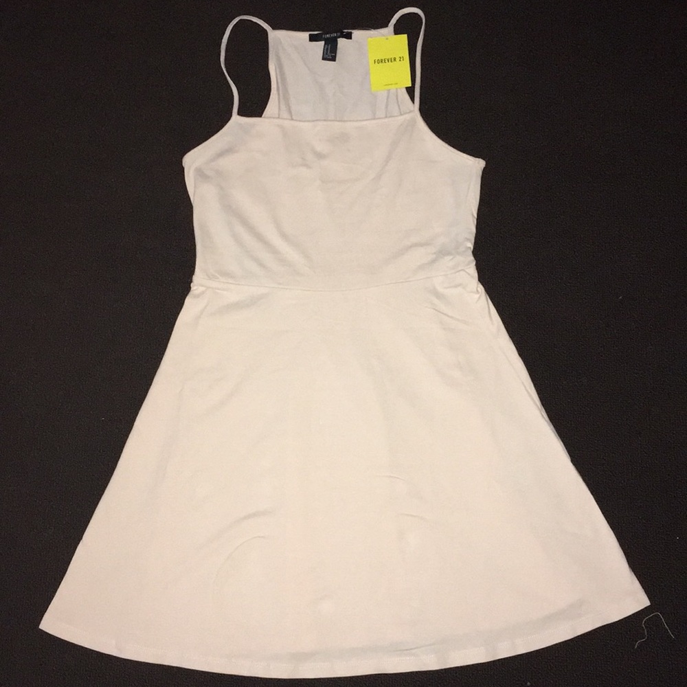 A beige, fit and flare dress.